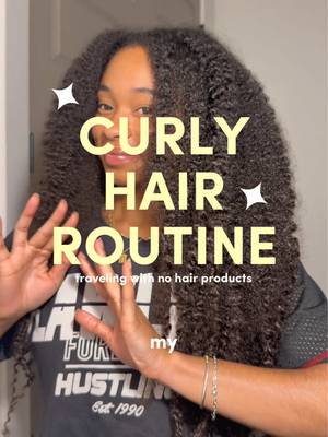 Traveling with no hair products means the routine has to EAT DOWN!👸🏽🌀😍✨ @Marc Anthony Hair curly envy cream + @amika frizz-me-not hydrating anti-frizz treatment is my combo fight frizz for days!!🙂‍↕️ Minha Beauty magic detangling brush as always melting through my tangles like butter (Comment “🔗” for the code for $$ off) - - - #curlyhair #naturalhair #longhair #blackgirlmagic #hairtok 