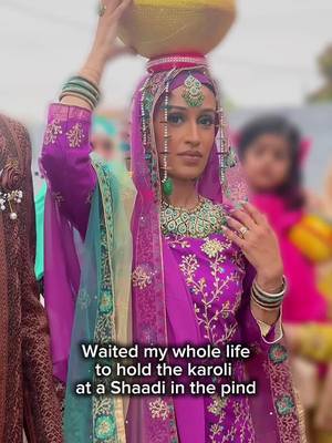 I was 6 years old when I attended my uncles wedding and was told I was to little to hold it, and then I was 14 at my cousins wedding and told I had to wait until I was married - so finally got to tick this off my bucket list on this trip! The karoli ceremony was traditionally when the women from the grooms family, accompanied by women from the brides family, would head down to the stream and collect water on the wedding day to wash the groom with. They would sing songs on the way to the stream and back, accompanied by other women from the village and surrounding areas. The water was carried in these clay pots (my gran could carry 3 stacked at a time in her youth!). This is now purely symbolic and just a bit of fun - we actually put sugar in it instead of water to give it some weight cos we'd probably end up spilling the water everywhere and the ritual is now done during the wedding week not the morning of the wedding  #punjabiweddings #karoli 