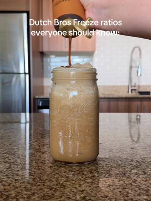 How to make a Dutch Bros Freeze at home🥶 Technicallyyyyy this is a carburetor at Dutch since their freezes are made using a slushie machine BUT if you ever ask for a sugar free sweetener or milk alternative or a hand blended freeze at Dutch, this is exactly how they make it🙏🙏 SMALL: 2 ounces sweetener 2 shots espresso Milk to 6 ounce line (about 2oz) 16 ounce cup of ice MEDIUM: 3 ounces sweetener 2 shots espresso Milk to 8 ounce line (about 3oz) 24 ounce cup of ice LARGE: 4 ounces sweetener 4 shots espresso Milk to 10 ounce line (about 3oz) 32 ounce cup of ice Personally I like a more creamy, less icy blended coffee so i recommend adding a tiny pinch of xanthan gum into the blender BUT that’s totally optional! Save this video for the next time you’re craving a DB FREEZE and FOLLOW for more CopyKat recipes!