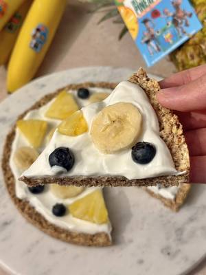 The snack table has a new main character. 🍕🍍  Fruit Pizza Recipe: Crust 👉 1 ½ cups rolled oats 👉 ½ cup almond flour  👉 2 tablespoons honey or maple syrup 👉 ¼ cup melted coconut oil 👉 1–2 tablespoons milk  Base Layer 👉 1 cup Greek vanilla yogurt Toppings 👉 2 Fresh Del Monte bananas, sliced 👉 1 cup Del Monte Gold® pineapple (cut into chunks or small shapes) 👉 Minimal blueberries See Disney and Pixar's #ToyStory5 in theaters June 19!  #freshdelmonte #fruit #freshfruit #ToyStory5 
