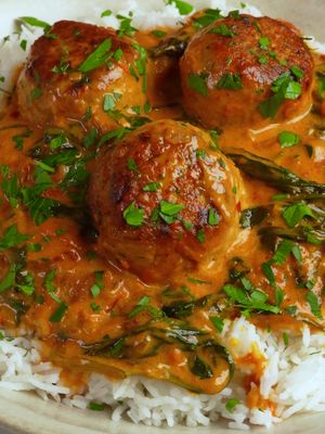Tuscan Chicken Meatballs I’m a big fan of Tuscan-style sauces. The combination of sun-dried tomatoes, spinach, tomatoes, and spices comes together into a rich, flavorful sauce that I could happily eat any night of the week. For the creamy base, you can use heavy cream (I personally use coconut milk), and while I usually make this with chicken breast, I decided to switch things up and go with tender, juicy chicken meatballs instead. Served over white rice, it was an absolute dream. #chickenmeatballs #easydinner #DinnerIdeas  Creamy chicken meatballs Tuscan chicken meatballs Easy chicken dinner Weeknight dinner recipe One pan chicken meatballs