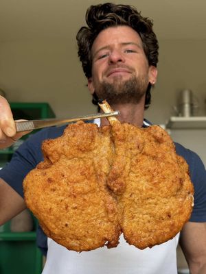 Crispy XL Pork Chops  🍋 Crispy, golden, and finished with a squeeze of fresh lemon. These breaded pork cutlets are easy to make and perfect for a weeknight dinner. Serve them with a simple salad and you've got a meal everyone will love.  Ingredients: Bone-in pork chops Flour Eggs Breadcrumbs Salt Frying oil Fresh lemon Directions: 1. Butterfly the pork chops by cutting them open without separating them completely. Pound them thin until evenly flattened. 2. Dredge each pork chop in flour, then egg, and finally breadcrumbs, pressing so the coating sticks. 3. Fry in hot oil for a few minutes per side until golden brown, crispy, and cooked through. 4. Transfer to a plate and season with salt while still hot. Serve with a squeeze of fresh lemon and a simple side salad. #pork #easyrecipe #fy 
