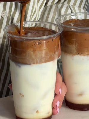 one for you & one for me 🧸☕️ recipe: add ice & @pink House Alchemy creamy caramel syrup to two cups (shamelessly obsessed with this flavor rn). add about 2/3 cups of 2% milk to each cup. in a separate glass, whisk together 3 rounded spoonfuls of instant coffee, 2 spoonfuls brown sugar, & 2.5 oz water whisked until nice & fluffy. divide evenly between cups. stir well before enjoying. #whippedcoffee #dalgonacoffee #icedcoffee #homecafé #coffee 