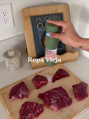 Ropa Vieja recipe 🇨🇺💃 Ingredients 2 lbs flank steak Salt and pepper, to taste Water (enough to cover the meat) Onions  Garlic cloves  Bay leaves 1 red bell pepper, sliced 1 green bell pepper, sliced Beef stock 1 can (8 oz) tomato sauce 1 tablespoon tomato paste Water  Dried oregano  Cumin Sazon Goya  Garlic powder  ¼ cup dry white wine Season the flank steak with salt and pepper. In a large pot, brown the steak on all sides. Add enough water to cover the meat, along with onion, garlic cloves, bay leaves, and salt. Bring to a boil, then reduce the heat, cover, and simmer for about 2 hours, or until the steak is fork-tender. Remove the steak from the pot and let it cool slightly. Once cool enough to handle, shred the meat and set aside. In a large skillet, sauté the sliced red pepper, green pepper, and remaining onion until softened. Add the remaining garlic and cook for about 1 minute until fragrant. Return the shredded beef to the skillet and add the beef stock, tomato sauce, tomato paste, water, bay leaves, oregano, cumin, steak seasoning, and white wine. Stir well, cover, and simmer for about 25 minutes, allowing the flavors to blend and the sauce to thicken. Taste and adjust the seasoning if needed. Serve with white rice, black beans, maduros, or tostones. #latinacontentcreator #cuban #ropavieja #cubanfood #comidacubana 