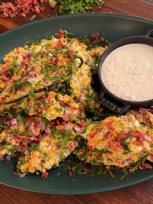 Elotes 🤝 Jalapeño Poppers 🔥 When two worlds collide, great things happen. Creamy street corn, smoky jalapeños, and just the right amount of heat—all wrapped up in one bite-sized masterpiece. Fair warning: make enough for seconds. #Traeger #TraegerGrills #TraegerRecipes #Traegerhood #JalapenoPoppers #Elotes #StreetCorn #BBQ #Grilling #BackyardBBQ #SummerCooking #GameDayFood