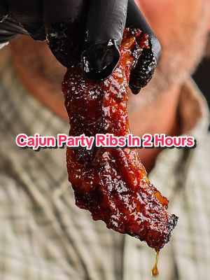 Cajun Style Ribs… A very quick way to make delicious ribs. Ingredients: •2 racks, pork baby back ribs •Meat Church Holy VooDoo •1 stick butter •10 oz Chef J’s Hot Honey Instructions: •Prepare your smoker to a temperature of 275. •Slice each rib individually.  •Sauce the ribs with hot sauce the season all sides each rib with Meat Church Holy Voodoo •Allow the seasoning to adhere for at least 15 minutes. •Place the ribs on wire racks and into the smoker. •Smoke the ribs until they are a beautiful mahogany color and 185° internal. •Drop in the butter and hot honey. Mix and toss until completely coated.  •Cover the pan with aluminum foil. Return the pan to the smoker and cook until they are tender. •Remove the pan from the smoker. Toss the ribs in the sauce one last time, remove from the pan and allow to cool. Enjoy! As always you can find the full recipe and how-to cooking video on meatchurch.com.