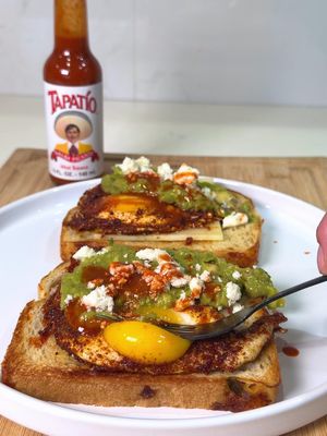 POV: You’re about to level up your breakfast 🌶️ Egg yolk pop? Check. Sourdough, chorizo, fried egg, avocado, queso fresco, cilantro—stacked and ready. Hit it with Tapatío for that spicy finish! Who’s drooling? 👀🔥 #TapatioHotSauce #EggYolkPop #SpicyBreakfast #FoodTok