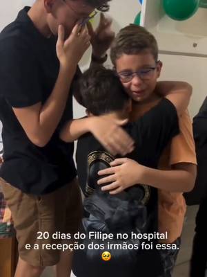 Brothers break down in tears when their sibling returns home after spending 20 days in the hospital