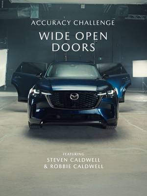 Ex-pro Steven Caldwell tests the Mazda CX-90’s wide-opening doors. See more of the CX-90 at Mazda.ca