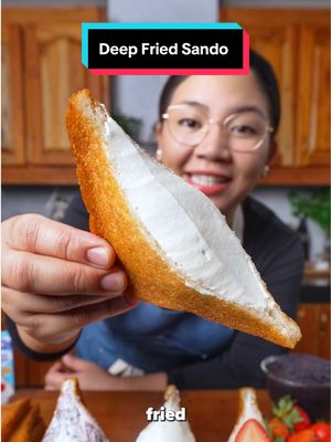 DEEP FRIED Sandwich 😱 Crispy, crunchy, golden on the outside and soft creamy inside. Ingredients 1 loaf Japanese milk bread or soft white bread  2 packs Nestle all purpose cream 250g (cold) 4 tbsp Powdered sugar (or more to achieve desired sweetness)  2 tsp Vanilla extract Neutral oil for deepfrying  Optional for garnish:  1/2 cup Ube halaya or jam  Fresh strawberries, cleaned and halved  Procedure:  1. Heat your oil to 350° F. Deep fry the milk bread slices until they are completely golden brown and crispy on both sides. Drain them thoroughly on a cooking rack to remove any excess oil. Set aside. 2. Whip your cold nestle all purpose cream until soft peak, , add powdered sugar, and vanilla extract until it holds stiff peaks. 3. While the bread is warm but safe to handle, slice each piece in half diagonally. Use a small, sharp knife to gently cut a pocket into the exposed crumb of each triangle, creating a hollow center for the filling. 4. Spoon the thick cream directly into the hollowed-out fried bread pockets. Optionally, press strawberry slices into the cream or spread ube halaya on top. Serve immediately and enjoy! #viral #japanesefood #sandwich #sando #abimarquez 