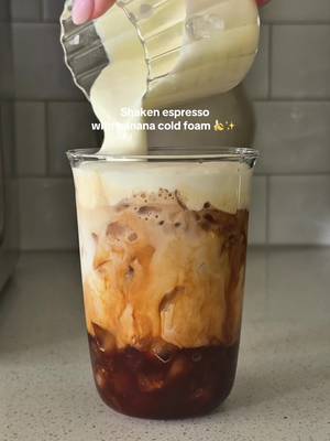 🍌✨ what could possibly make a brown sugar shaken espresso better?! Banana cold foam of course 🤤  Recipe:  2 shots espresso brewed over 1 tsp brown sugar, 1 tsp vanilla bean paste  -shake over ice  -Add ice & milk  Cold foam:  2 tbsp heavy cream  2 tsp banana cream instant pudding mix- froth and pour over coffee  #CoffeeRecipe #coffeeathome #shakenespresso #bananalatte #coffeetiktok 