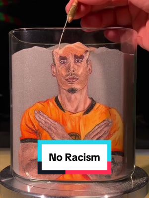 Every grain tells the same story: football is for everyone. FIFA's #NoRacism campaign reinforces the organisation's clear, zero-tolerance position on racism in football and society. [@FallingInSand]