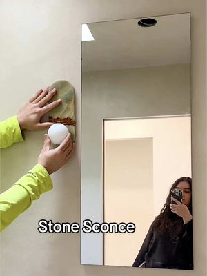 Help me decide whether my new guest bath sconces should have the bulb at the top or the bottom 🤔 I originally purchased these thinking the bulbs would be on top, since the ceilings in our two guest bathrooms aren’t very high. When the bulb sits at the top, it makes the room feel taller because it draws your eye upward. But when I look at the fixture with the bulb at the bottom, I feel like it highlights the stone more because the light from the skylights enhances it. When the bulb is on top, it casts a shadow, but when it’s on the bottom, it doesn’t. Which are we choosing???? #homedecor #sconces #renovation #houseupdate #lightfixtures 