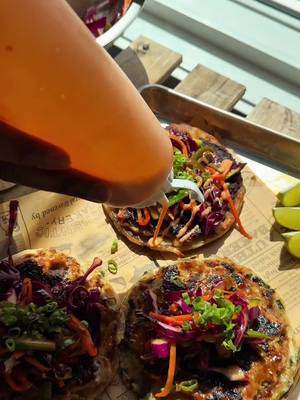 These crispy scallion pancake smash tacos are loaded with seasoned ground chicken, hoisin glaze, Bang Bang sauce, crunchy slaw, scallions, spicy furikake, and fresh lime for the ultimate weeknight dinner.
