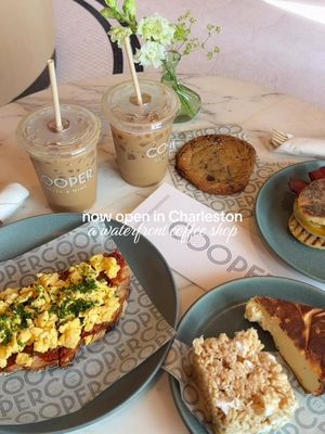 Charleston’s newest hotel, The Cooper, has officially opened its coffee shop up to the public with a brand new menu! Sip coffee, indulge in a delicious breakfast or lunch while you enjoy the view of the ocean! A waterfront coffee shop?! Say less 🌴🩵☕️😍 #charlestoncoffee #charleston #travelcontentcreator #chs #charlestonfoodie @