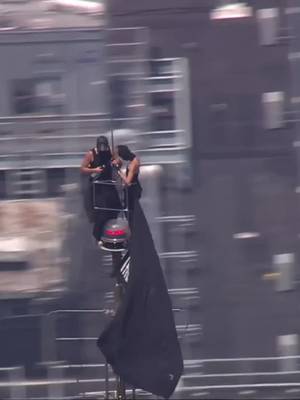 BREAKING: Two people have climbed to the top of the Empire State Building in New York City, holding a banner from the skyscraper's antenna reading, "When the power of love beats the love of power, the world knows peace." As of now it's unclear how the pair reached the top of the building as police work to get them down from the spire, 1,454 feet above the ground.