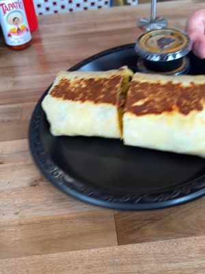 POV: You add @tapatiohotsauce to your breakfast burrito and instantly level up your morning. 🌯🔥 Who else can’t do breakfast without a little heat? Comment your favorite burrito combo below! 👇😋 #TapatioChallenge #BreakfastGoals