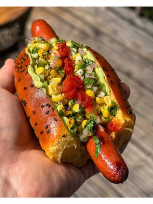 Everyone's talking about burgers this grilling weekend. I'm here to talk about the buns. Sweet potato hot dog buns, avocado crema, grilled hot dogs, and a fresh corn relish. This might be my favorite July 4th bite yet. I took my go-to potato bun recipe and swapped the potatoes for sweet potatoes, using @Bob’s Red Mill Organic Bread Flour for the perfect texture. Naturally golden buns that stay unbelievably soft, moist, and fluffy for days. Honestly, they might steal the show from what's inside them. Full recipe link in my bio! YASSS!