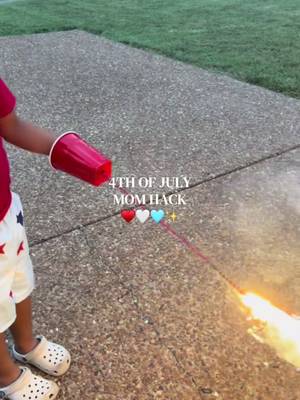 Kids want sparklers but you have anxiety? Try this mom hack! ♥️🤍🩵✨ ✨Poke a hole in a solo cup ✨Have them hold the sparkler in the solo cup to where the cup is covering their hand  Hope everyone has a safe and happy Fourth of July! 🎆✨ #momhack #toddlermom #momtips #fourthofjulyweekend 