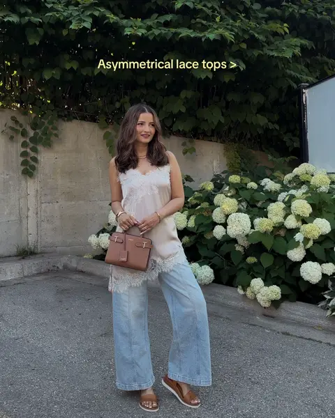 Neutral summer outfits will always have my heart 🤎 top @RW&CO  jeans @Gap  bag @Le Tanneur Emilie Small #SummerOutfitIdeas #EuropeanSummer #LaceTop #WideLegJeans #neutralstyle 