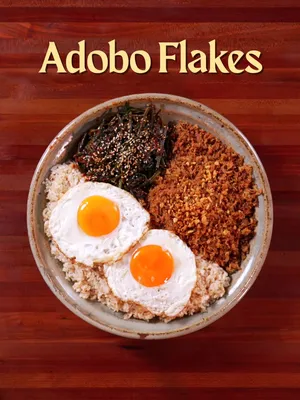 🇵🇭 Adobo Flakes w/ Pako Kimchi 🇰🇷Collab w/ @Kevin  Here’s my take on the best way to have your leftover adobo by making it into yummy crunchy strands. Usually we have it w/ Vinegar or a sort of pickle. We have a special guest today so we decided to pair it with a  quick kimchi made with an indigenous edible fern called “Pako” known for its addicting crisp texture! Also using my take on a pre-colonial Adobo Recipe called “Adobo sa Puti” that doesn’t use soy sauce so it retains a golden color when toasted :) *we kinda measured by feel so these measurements are just estimates. taste and season as you go! INGREDIENTS: Adobo: - Banana leaves - Pork lard as needed - 1 kg of pork shoulder, cubed - 5-10 bay leaves - 1 tbsp of peppercorns - Salt to taste  - 20-30 cloves of garlic, or to your hearts desire - 5-6 of long green chilies - ¼ cup of fish sauce - ⅔ cup of coconut vinegar (or white vinegar)  - Water as needed Pako:  - 500g of pako or fiddlehead fern, chopped - Salt - Hot water - Ice  Kimchi blend: - 1/2 cup garlic - 1 onion, chopped - 1-2 mangoes, chopped - 1 cup cooked rice - ¼ cup sugar - 1-2 tbsp fish sauce - Water as needed - Gochugaru as needed - 1 bunch garlic chives Others: - Fried egg - Garlic rice INSTRUCTIONS:  - For the adobo, add all the ingredients under “Adobo sa Puti” into a pot. cook for 1–2 hours on low, or until the pork is tender. shred into flakes - Fry the shreds on low heat w/ a little oil/lard until crispy and golden. - For the pako , add salt and pour over hot water. immediately shock it in ice water. - For the kimchi base, blend all ingredients under “Kimchi Blend,” except for the gochugaru and chives. Transfer to a bowl, mix in gochugaru, chives and pako and toss until well coated. - Serve with garlic rice, fried egg and enjoy! #cookingasmr #asmr #filipinofood 