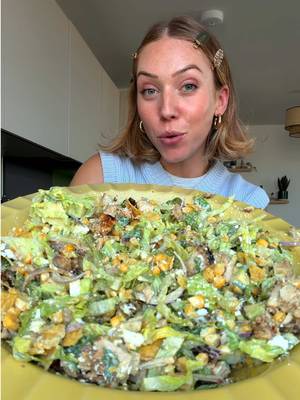 CHARRED CORN, CHICKEN & AVO SALAD with @fage_uk ad If you've followed me for a while, you'll know I alwayssss have tubs of FAGE Total yoghurt in my fridge. It's honestly one of my kitchen staples, and not just for breakfast !! I use it in everything from marinades to dressings to dips as it’s so creamy and naturally rich in protein. Here, the yoghurt keeps the chicken beautifully juicy, then transforms into the creamiest jalapeño + lime dressing that ties everything together. Completely YUM. Serves 4. For the chicken: ▫️650g skinless, boneless chicken thighs ▫️ 100g FAGE Total 5% ▫️ 1 tsp smoked paprika ▫️ 1 tsp ground cumin ▫️ ½ tsp dried oregano ▫️ ½ tsp garlic granules ▫️ salt and pepper For the dressing: ▫️ 250g FAGE Total 5% ▫️ 30g sliced jalapeños  ▫️ 1 garlic clove ▫️ Juice of 1 large lime ▫️ 1 tsp honey ▫️ 1 tbsp extra virgin olive oil ▫️ Small handful coriander (including the stalks) For the salad: ▫️ 3 corn on the cobs (or frozen sweetcorn) ▫️ 1/2 red onion, finely sliced ▫️ 1 large avocado, diced ▫️ 100g feta, crumbled ▫️ 1 romaine lettuce ▫️ a small handful coriander, roughly chopped ▫️ a handful of lightly salted tortilla chips, crushed Method 1. In a large bowl, combine the chicken with the FAGE Total yoghurt, smoked paprika, cumin, oregano, garlic granules, a generous pinch of salt and plenty of black pepper. Mix well to coat, then leave to marinate for at least 20 minutes, or overnight if you have time. 2. Next, char the corn. If using fresh corn, lightly brush with oil and cook in a very hot griddle pan or barbecue for 10-12 minutes, turning occasionally until lightly charred all over. Alternatively, roast at 220c fan for 20-25 minutes until golden in places. If using frozen sweetcorn, pat it very dry, then cook in a large dry frying pan over a high heat for 8-10 minutes, stirring only occasionally, until lightly charred. Leave to cool slightly, then slice the kernels from the cobs if using fresh. 3. Add all of the dressing ingredients to a blender and blitz until completely smooth. Season well with salt and black pepper. If you'd like a slightly looser dressing, blend in a splash of cold water. 4. Heat a large frying pan over a medium-high heat with a drizzle of olive oil. Shake off any excess marinade, then lay the chicken thighs into the pan. Cook for 6-7 minutes without moving them, until deeply golden, before turning and cooking for a further 5-6 minutes, or until cooked through. Leave to rest for 5 minutes before slicing. 5. Add the charred corn, romaine, sliced chicken, avocado, red onion and coriander to a large serving bowl. Pour over most of the dressing and gently toss everything together. Scatter over the feta and crushed tortilla chips, then drizzle with the remaining dressing before serving. ENJOY! #saladrecipe #heatwavefood #whatieat 