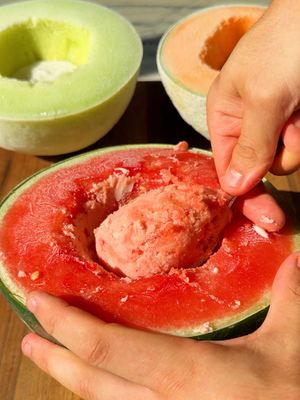 Two Ingredient Melon Ice Cream is exactly as delicious as it looks on the internet. Coconut milk is the way to go and topping it with lime juice and tajin is a perfect final touch…although that makes it four ingredients! #Recipe #watermelonicecream #easydessert #icecream 