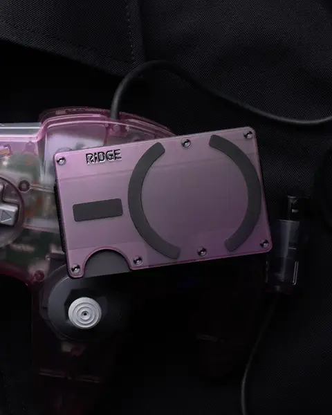 Straight from the clear-tech era. Atomic Purple puts the build on display across Ridge wallets and the magnetic power bank. Limited edition.