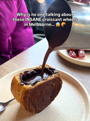 📍📍HERE📍📍 Follow @brittandmitchworldwide for more epic Melb food spots 🍽️☕️ Croissant… or hot chocolate? Why not both? 🤯🥐🍫 When we saw these croissant wheels from Calle Bakery in Carlton North we knew we HAD to try them and WOW!!!! They live up to the hype! They are lined with a chocolate ganache, filled with hot chocolate, and they come in two flavours… the OG hot chocolate and the Dubai pistachio hot chocolate. 🤤  Only available Friday-Sunday for limited time so don’t miss out! @callebakery  Which one are you choosing… OG or Dubai Pistachio? 👇 #melbo#melbournefoodo#melbourneeatso#melbournecafest#visitmelbournery 