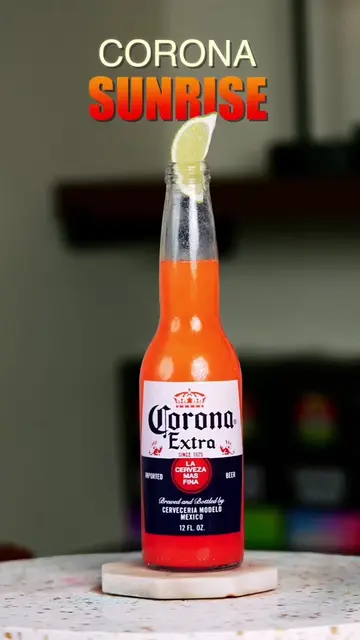 Want to learn how to make delicious cocktails? 🍹 Join The Bartender Academy through the link in my bio! 🍺 Corona Sunrise! 🌅 A delicious beer cocktail! Have you ever tried one? It’s one of my favorite summer drinks, perfect for a hot summer day! ☀️🍹 Ingredients: • 1 Corona • 2 oz tequila (this time, I used coconut tequila) • 2 oz orange juice • 1 lime wedge, squeezed • ½ oz grenadine #C#CoronaSunriseB#BeerCocktailS#SummerCocktailsT#TequilaCocktailCocktailRecipe