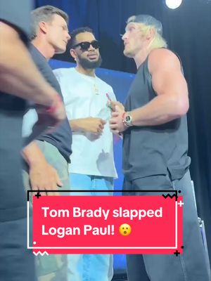 Karl-Anthony Towns had to separate Tom Brady and Logan Paul during their on-stage appearance at Fanatics Fest! 🎥: @WWE  