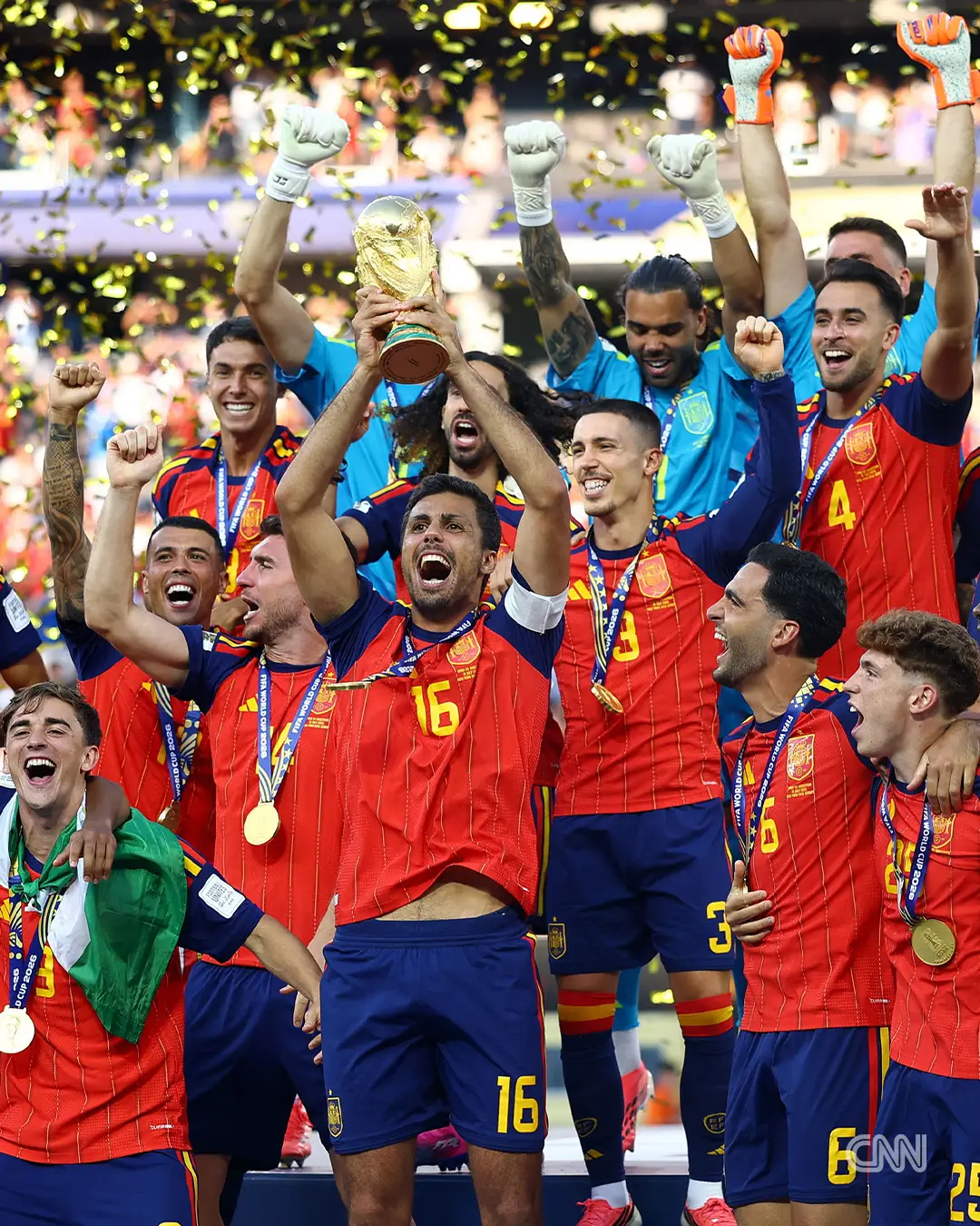 With its World Cup win, Spain is the first country to be reigning men's champion of the world championship, European Championship and Olympics simultaneously. Rodri, the Spanish midfielder, took the World Cup trophy from FIFA President Gianni Infantino and US President Donald Trump and lifted it high into the air as confetti fell around him at MetLife Stadium in New Jersey. A host of other trophies were handed out before Spain got its hands on their prize. Spanish defender Pau Cubarsí was named the best young player at the tournament after the 19-year-old helped guide his side to total dominance. Unai Simón was awarded the Golden Glove for being the best goalkeeper this summer. The keeper only conceded once the whole tournament. To complete the hat trick, midfielder Rodri won the Golden Ball for the best player of the tournament. And finally, France's Kylian Mbappé was named the winner of the Golden Boot after scoring 10 goals, becoming the World Cup all-time top scorer. As part of the post-game celebration, the defeated Argentina got their runners-up medals from dignitaries. In an emotional moment, tears rolled down Lionel Messi's face as he stood on the pitch after receiving his medal, looking around the stadium in what very well could be his last time in the Argentina shirt as a player. 📸: REUTERS/Hannah Mckay; REUTERS/Dylan Martinez; Tom Weller/picture-alliance/dpa/AP Images; REUTERS/Dylan Martinez; REUTERS/Amanda Perobelli; Paul ELLIS / AFP via Getty Images
