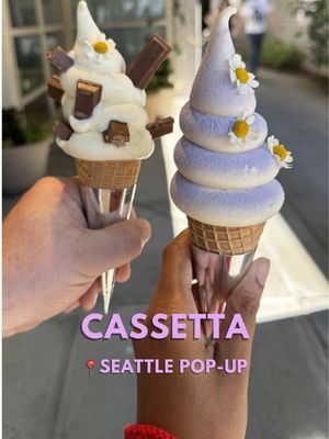 Y’all know I don’t usually wait in long lines for food, but I had been curious about the ice cream at @Cassetta Seattle since they started having pop-ups in Seattle last year.  We waited around 20 minutes and had a chance to look through the menu during that time. We decided on the taronie (soft serve with taro powder) and the KitKat (soft serve with KitKat pieces) both in cones (cups are also an option). 🍦The ice cream was very good and a generous portion. At about $9 a scoop it’s on the pricy side for us, but it was fun to finally try. What makes it stand out is the care and precision that the Cassetta team puts into hand-decorating every scoop with flowers, fruits, and powder. It is very cute!  Have you tried this popular ice cream before? Let me know in the comments. Follow Cassetta to find out where they’re scooping next.  ⭐️ Follow me for more unique Seattle eats and drinks! 📍Location: Cassetta - pop-ups around Seattle and California. We went to their West Seattle pop-up at @Hoste  💵 Price range: Roughly $8-$9 per scoop  … … #seattle #seattledesserts #seattlefoodblogger #seattlefoodie #icecream  Seattle desserts, Seattle pop-up, Seattle food blogger, where to get ice cream in Seattle