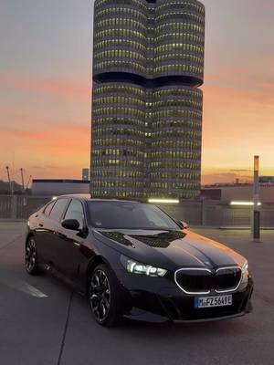 sunset at HQ just hits different 🌇 #BMW #THEi5 #5SERIES BMW i5 xDrive40 Sedan. Mandatory information according to German law 'Pkw-EnVKV' based on WLTP: energy consumption combined: 17.9 kWh/100 km; CO₂ emissions combined: 0 g/km; CO₂ class: A; electric range: 513-515 km.