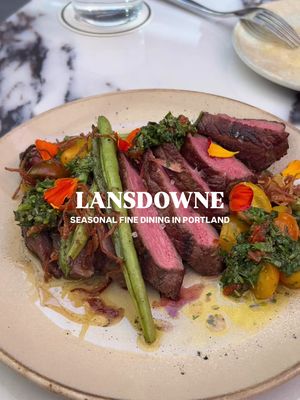At a Beli rating of 9.7/10, this might be my new favorite restaurant in Portland. 🙂‍↕️🫶 Lansdowne (@lansdownepdx) is a gem tucked away in NW Portland, featuring a rotating menu that highlights seasonal, locally sourced Pacific Northwest ingredients. I had this spot bookmarked after seeing their gorgeous patio on Instagram and hearing a few local creators rave about the food. ✨ My uncle was visiting from California, and it ended up being the perfect place to enjoy Portland’s summer weather over an incredible meal featuring local ingredients. What we ordered: ♡ Pink Lady cocktail ♡ Glass of Columbia Valley, WA white wine ♡ Oysters ♡ Focaccia with whipped brown butter honey ♡ Cavatelli ♡ New York steak ♡ Chocolate cake I love a good gin cocktail and the pink lady really hit the spot for me! It was perfectly balanced with the right amount of sweetness. 🍸  Every dish was fresh, flavorful, and beautifully executed, making it nearly impossible to choose a favorite. 🥹 That said…the focaccia completely stole the show for appetizers. The bread was unbelievably fluffy, and the whipped brown butter honey was absolute perfection. 🤤  The cavatelli pasta was cooked perfectly al dente and featured cucamelons, an ingredient we had never tried before, which made the dish even more fun and memorable. The aged New York steak was incredibly tender, and the bright chimichurri-style sauce paired so well with the sweet, juicy tomatoes. 💕 We ended off with the chocolate cake which was decadent, dense and not too sweet. 🍫 Every single dish impressed us, and I’m already looking forward to coming back. I can’t wait to see how the menu changes with the seasons, and I look forward to trying their tasting menu in the future 😄 📍Lansdowne | Portland, OR  💸 $80+ per person  🏷️ #portlandfoodie #portlandeats #pdxfoodie #pdxfood #pnwsummer portland must try • portland oregon • portland patios • portland food