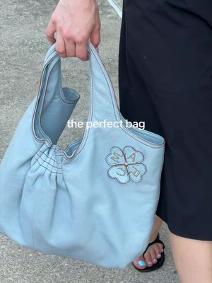 Elevating my outfit with a fun bag is my go to @Poshmark #poshmarkpartner
