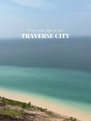 #ad This is your sign to visit Traverse City, Michigan🍒✨  Just a 2-hour nonstop flight from Boston International Airport to @Traverse City Airport Traverse City, you’ll find award-winning wineries, crystal-clear waters, cherry orchards, incredible food, and iconic places like Sleeping Bear Dunes 🏖️ One of the most breathtaking landscapes in the Midwest!  The best time to visit? June through October, when you can enjoy cherry season, beach days, wine tasting, boating on Grand Traverse Bay, and stunning fall colors. Save this for your next getaway! 🍷☀️ @Traverse City  #traversecity
