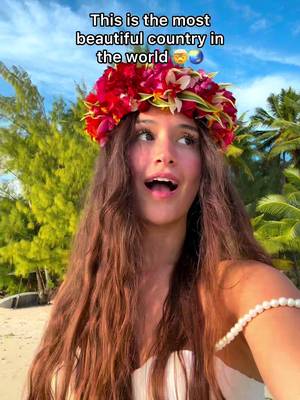 It’s so crazy that this place exists, its an actual dream! 😍 And lots of people have never heard of it, but it’s super easy to get there from the U.S.! What makes the Cook Islands so special isn’t just the crystal clear blue water. It’s the way they’ve protected their islands and culture. There are no giant hotel chains, no fast-food chains, no skyscrapers, and every business you visit is locally owned. The food is so fresh, life moves slower here, and that’s what makes it so magical! To get there, we flew from Los Angeles to Tahiti with Air Tahiti Nui and from there, we hopped on an Air Rarotonga flight straight to the Cook Islands, and the views the entire way were unreal. If you’re looking for somewhere that still feels untouched, where you can spend your days swimming in crystal clear lagoons, hiking in the mountains, meeting some of the friendliest people we’ve ever met, and watching sunsets that don’t even look real, put the Cook Islands on your bucket list! 🩵   #cookislands #rarotonga #travel #aitutaki #tropicalvacation 