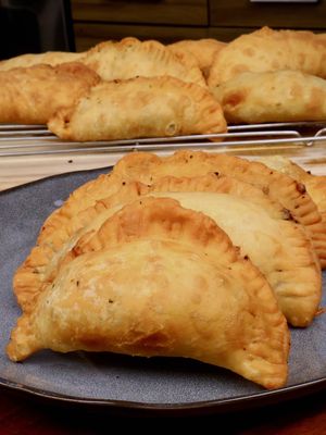 Louisiana meat pies, better known as Natchitoches meat pies, are more than just a snack. They're a piece of Louisiana history. While the tradition of meat-filled pastries was brought over by European settlers, Creole cooks in the Cane River region transformed it into the spicy, deep-fried hand pie we know and love today. More than 200 years later, it's still a Louisiana staple, and if you've ever been through the state, you know you can grab one just about anywhere. Have you ever heard of this dish, and if not, would you give this a try? This recipe can be found on my website in my bio. #risascuisine #meatpies #neworleans #creoleculture 
