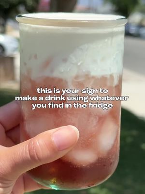 This is your sign to make a drink using whatever you find in the fridge!! I’ve been back in my hometown of LA for the past couple days, so you know I always have to find random things to mix up in my mom’s fridge 🙂‍↔️ this was.... SO TASTY! This just goes to show that sometimes it’s the ingredients you already have that can make something amazing 🍒✨ I thought it tasted like cherry blossom and my mom thought it tasted like cherry vanilla ice cream 🌸🍨 Thanks for letting me raid your fridge, @iamllotuss! here’s what I used: • 2 tbsp earl grey simple syrup, divided • 1 1/2 oz (45 ml) heavy whipping cream  • ice • @sanpellegrino_us Cherry CIAO! Add 1 tbsp of earl grey syrup and the heavy whipping cream to a small cup and froth for 30-45 seconds. Add the rest of your earl grey syrup, ice, and cherry sparkling water to your glass and top with the earl grey cream top. Stir + enjoy! #homecafe #dirtysoda #earlgrey #mocktails 