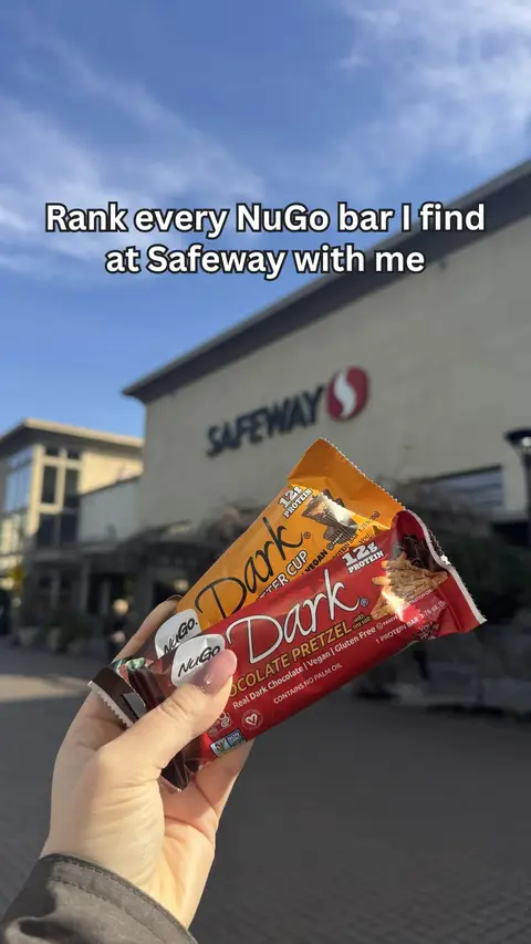 NuGo Dark spotted at Safeway stores. Now let’s review the review. 👀🍫 Swipe through @fiona.beata’s scores and tell us which flavor should rank higher. #NuGoBars #SafewayFinds #ProteinBarReview #VeganSnacks #GlutenFreeSnacks #FoodTok