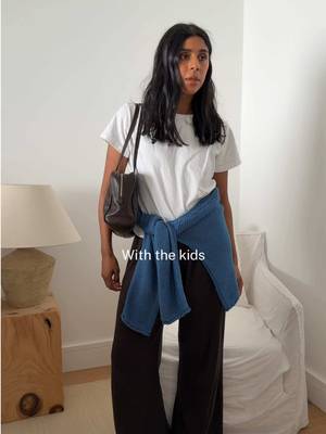 Very subtle changes for with/without the kids Look 1 - tee, jumper, bottoms all Leset. Bag is The Row and flip flops are @AncientGreekSandals. Changed into white Leset Nando pants.  Look 2 - Overals are Leset (again!) just changed the bag from @Prada to a @St. Agni suede.  Look 3 - Tank Flore Flore. Towel pants @suziekondi. Swapping my The Row Idaho with the kids, for the 90’s when without them. 