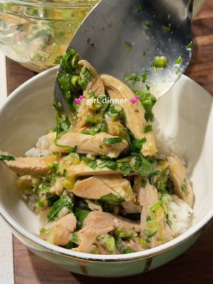 Steamed Chicken with Ginger Spring Onion Sauce 🍗🫚🍚 By placing a small bowl upside down in the middle of your steaming dish, creates a vacuum that captures all the pure, liquid-gold chicken essence as it cooks. The secret for the richest, most flavourful sauce, and it makes prepping the chicken a breeze. Chicken: 4 chicken drumsticks 4–5 slices fresh ginger 1 stalk spring onion, cut into batons Sauce: 2 stalks spring onion, finely chopped 6 cloves garlic, finely diced 1 knob ginger, grated 1/2 tbsp salt 3 tbsp neutral oil Chicken essence 2 tbsp light soy sauce 1.5 tbsp oyster sauce 1/2 tbsp sugar 1/4 cup fresh coriander, finely chopped 1.Place a small bowl upside down in the center of a larger, curved heat-proof bowl. Arrange chicken around the inverted bowl. Scatter the ginger slices and spring onion batons over the top. 2. Steam chicken for 20–25 minutes.  3. While chicken is steaming, combine finely chopped spring onion, diced garlic, grated ginger, and salt in a heatproof bowl.  4. Heat oil in a small pot until lightly smoking & pour over aromatics. 5. Once chicken is cooked, remove the drumsticks and let it rest. Gently lift the inverted bowl to reveal all the captured, concentrated chicken essence. 6. Combine chicken essence with aromatic mixture. Stir in light soy sauce, oyster sauce, and sugar. Taste and adjust the seasoning if needed! 7. Thinly slice steamed drumsticks and add to the sauce. Toss in the finely chopped coriander, and serve with rice. #girldinner #chickenrecipe #easydinner #EasyRecipes #fypシ゚ 