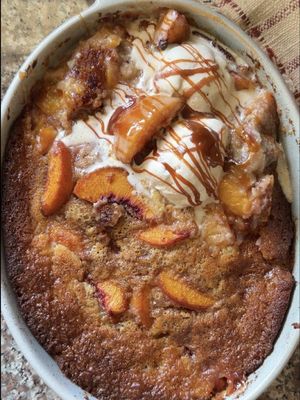 🍑✨ This Brown Butter Peach Cobbler by @Mimo is everything you want in a summer dessert. Juicy peaches are tucked beneath a rich, nutty brown butter batter that bakes up golden and crisp around the edges, creating the perfect balance of soft fruit and buttery crunch. Serve it warm with a scoop of vanilla ice cream, and you've got a dessert that's guaranteed to disappear fast. 🤤🍨 Get the recipe at the link in her bio! 💛