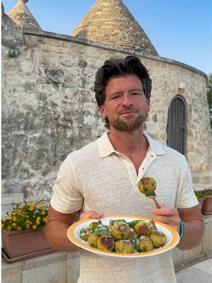 Zucchini Meatballs? 👀🇮🇹 In Italy, zucchini somehow find their way into everything during the summer… even meatballs! These crispy zucchini meatballs are one of my favorite ways to make the most of fresh summer zucchini. Instead of making zucchini pasta, give these a try.  Ingredients 1 lb (500g) zucchini, cut into small cubes 2 eggs 1 cup (80g) grated Parmigiano Reggiano 1 1/2 cups (200g) plain breadcrumbs 1 garlic clove, crushed Fresh parsley chopped Fresh basil Salt Black pepper Extra virgin olive oil Instructions:  1. Heat olive oil in a large skillet over medium heat. Add the zucchini and sauté for 8–10 minutes until soft. Let cool slightly. 2. Transfer the zucchini to a large bowl. Add the eggs, Parmigiano Reggiano, breadcrumbs, garlic, parsley, salt, and pepper.  3. Mix until well combined. If the mixture is too wet, add a little more breadcrumbs.  4. Lightly wet your hands with water and roll the mixture into golf ball-sized meatballs. 5. Heat a generous layer of extra virgin olive oil in a skillet over medium heat. 6. Fry the meatballs for a few minutes until golden on all sides.  7. Finish with freshly grated Parmigiano Reggiano and fresh basil. #zucchini #easyrecipe #fyp 