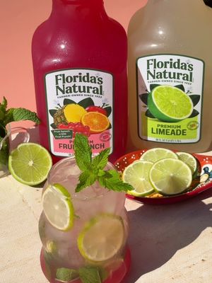This nojito has all kinds of goodness!! #sponsored I used @Florida's Natural Fruit Punch + Limeade along with a few simple grocery store additions and the result was delicious! 🍋‍🟩🍎🍍 My new favorite hack is adding Fruit Punch to my nojitos -- it adds orange, grapefruit, pineapple, and grape and along with the Limeade?? Chuggable ✨ Ingredients — 1 serving • 2 sprigs of mint • 1/2 of 2 limes, quartered • ice • 4 oz (120 ml) Florida's Natural Fruit Punch • 6 oz (180 ml) Florida's Natural Limeade • 2 oz (60 ml) sparkling water • lime slices, for garnish Start by adding the leaves of 1 mint sprig and lime to your glass and muddle. Next, add in your ice followed by your Florida's Natural Fruit Punch and Limeade and top with sparkling water. Garnish with some lime slices and a sprig of mint. Stir + enjoy! #fruitpunch #limeade #FloridasNatural #AllKindsofGoodness 
