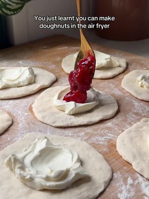 What can’t the air fryer do? 👀 This time @Cahill  is turning pantry staples into the ultimate sweet treat with these strawberry cheesecake doughnuts 🍓 Who doesn't love an easy dessert? Recipe linked in our bio! #donut #doughnut #Recipe #dessert #airfryer 