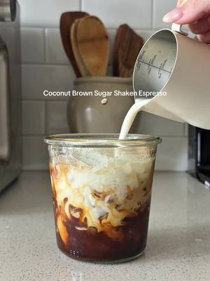 Coconut Brown Sugar Shaken Espresso ☕️🥥🌴 using the toasted coconut syrup by @Amoretti!  Recipe:  Brew 2 shots espresso over-  1 tbsp brown sugar  1 bsp toasted coconut syrup  1 tsp vanilla bean paste  Pinch of salt  Dash of cinnamon  Shake over ice- add milk & enjoy 🫶🏼  #coffeeathome #CoffeeRecipe #shakenespresso #coffeetiktok 