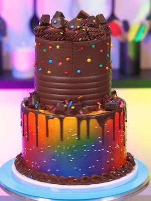 Meet Big Deborah! Turning the Little Debbie Cosmic Brownies into a cake. I used chocolate cake layers for this and tried my best to decorate this with inspo from the box. The airbrushing was a little crazy at first, but you gotta trust the process because I sure didn't. Any other Little Debbie snacks I should turn into a cake? #cakedecorating #littledebbie #cosmicbrownie #fyp 