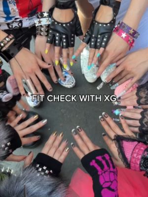 @xg.official poses for a quick fit check with WWD backstage at #HeadintheClouds LA Video: @kristinekwak